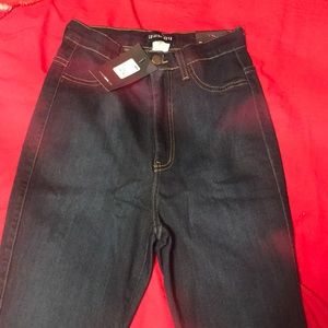 Dark wash high waisted skinny jeans, never worn